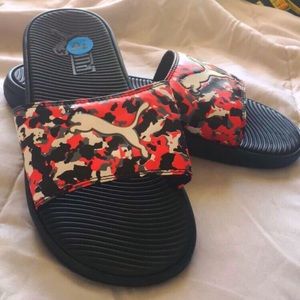 Puma slides.